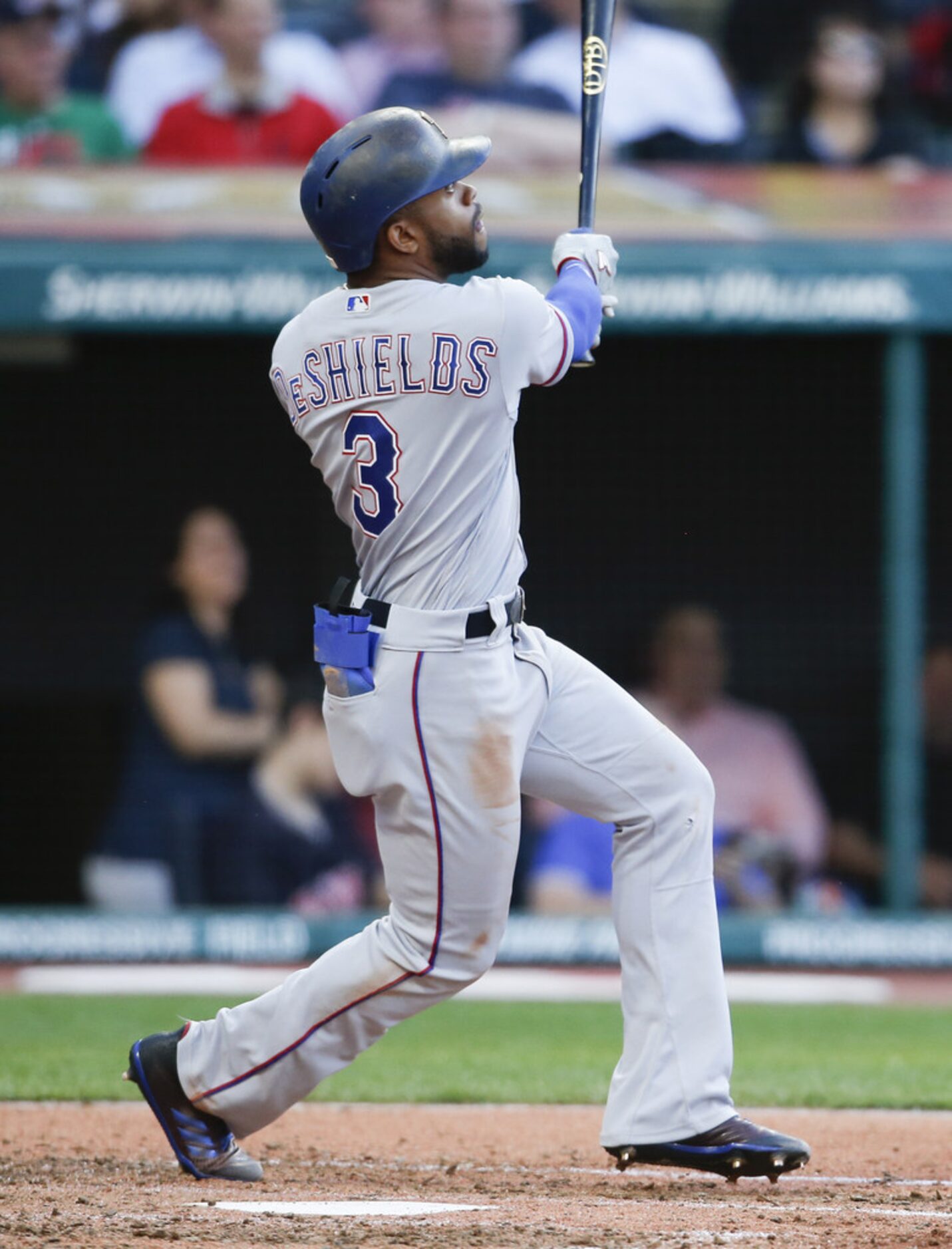 CLEVELAND, OH - MAY 01: Delino DeShields #3 of the Texas Rangers hits a solo home run off...