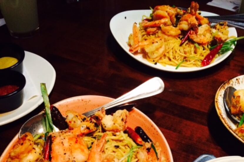  Long life noodles and prawns are part of the Lunar New Year menu at P. F. Chang's.