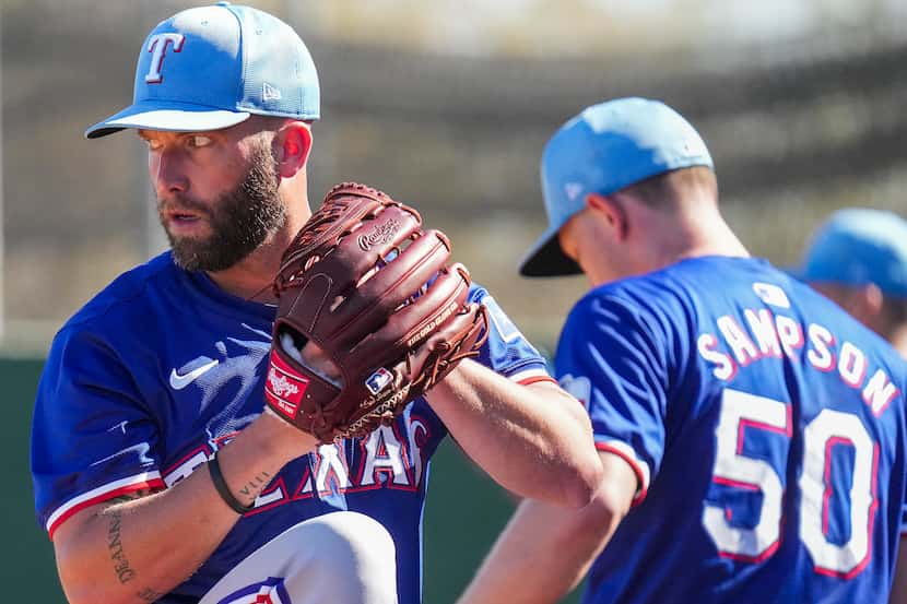Texas Rangers pitcher Danny Duffy throws in the bullpen during a spring training workout at...