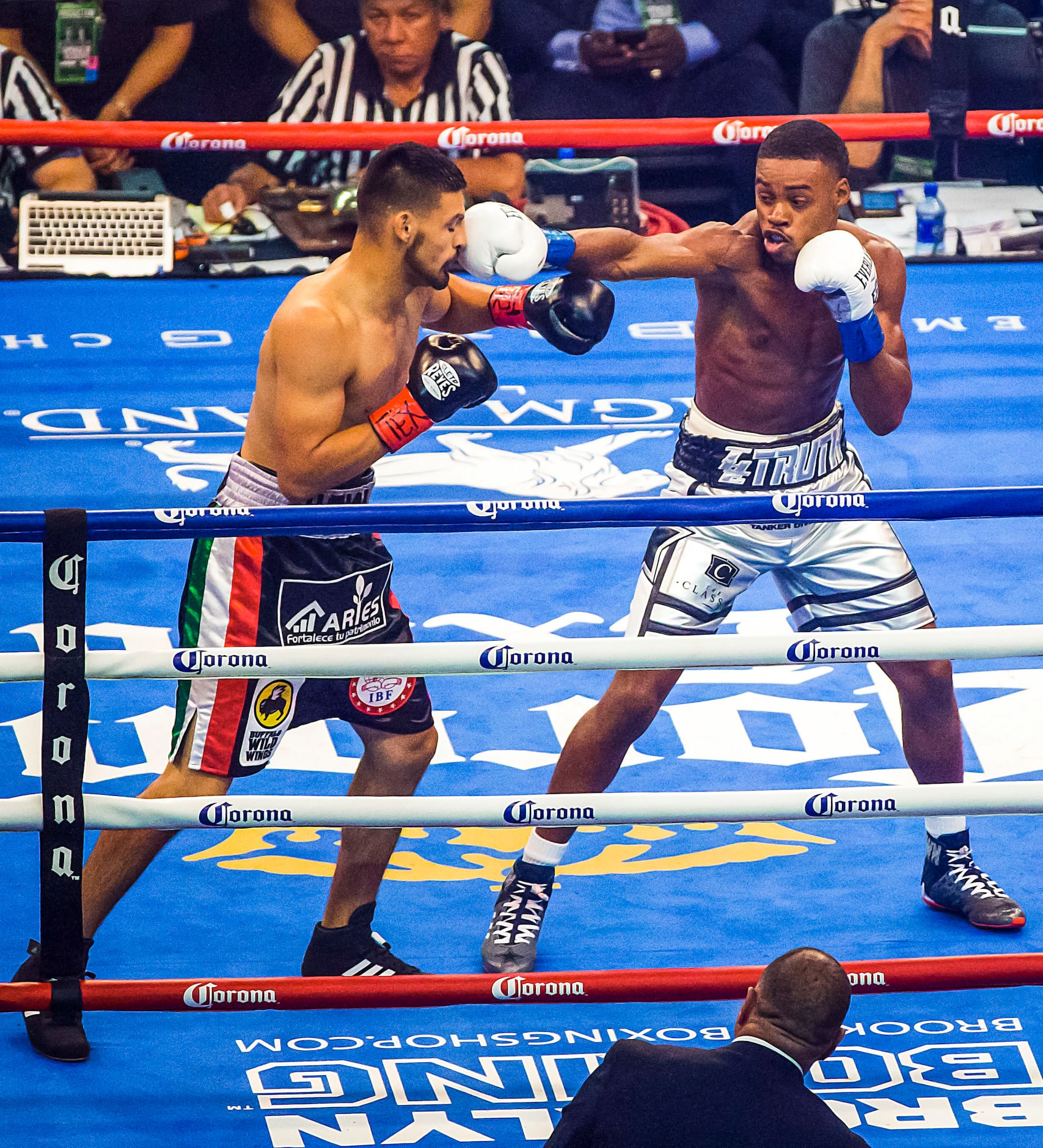 Welterweight champion Errol Spence Jr. lands punch on mandatory challenger Carlos Ocampo in...