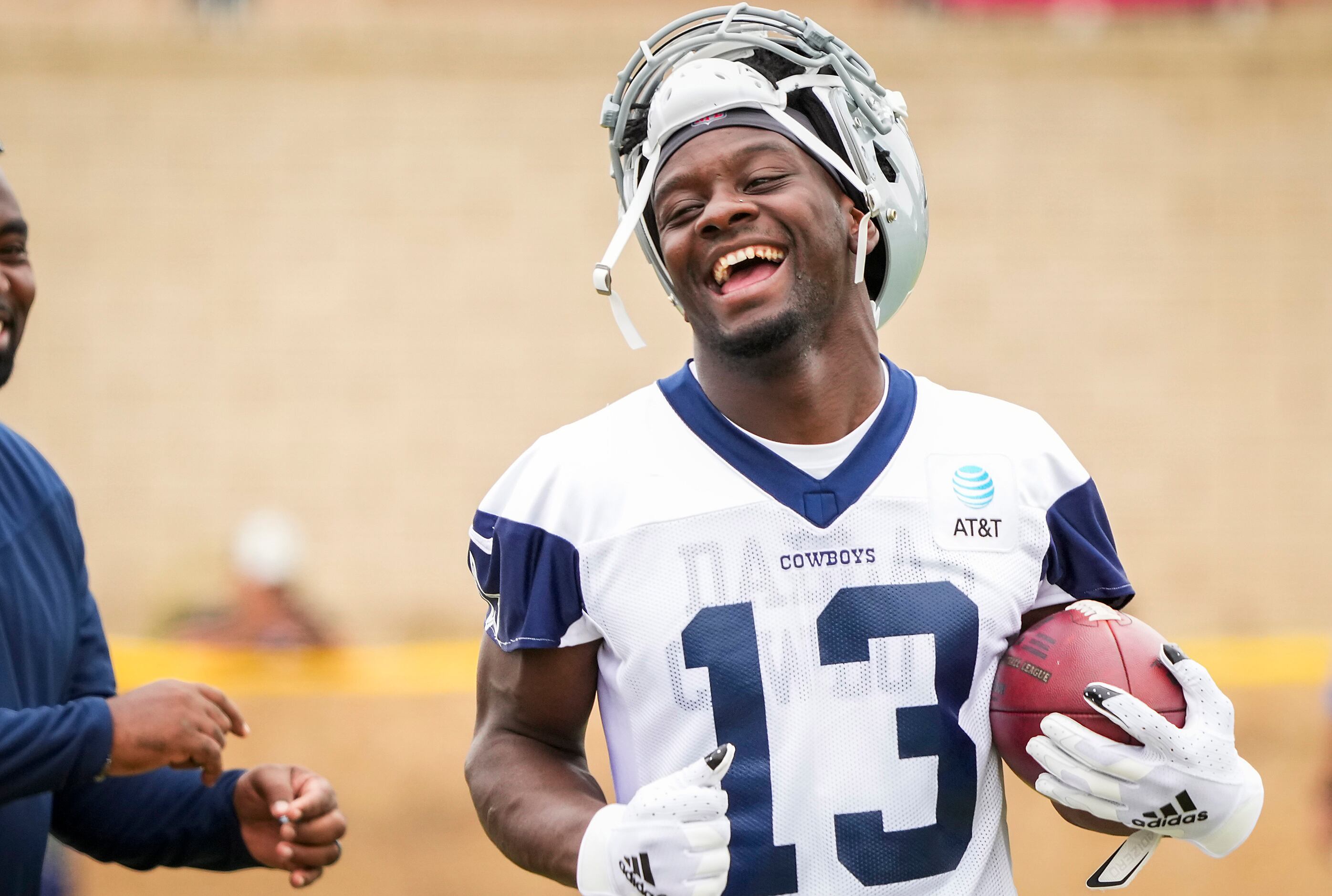 Dallas Cowboys wide receiver Michael Gallup smiles on the sidelines during a practice at...