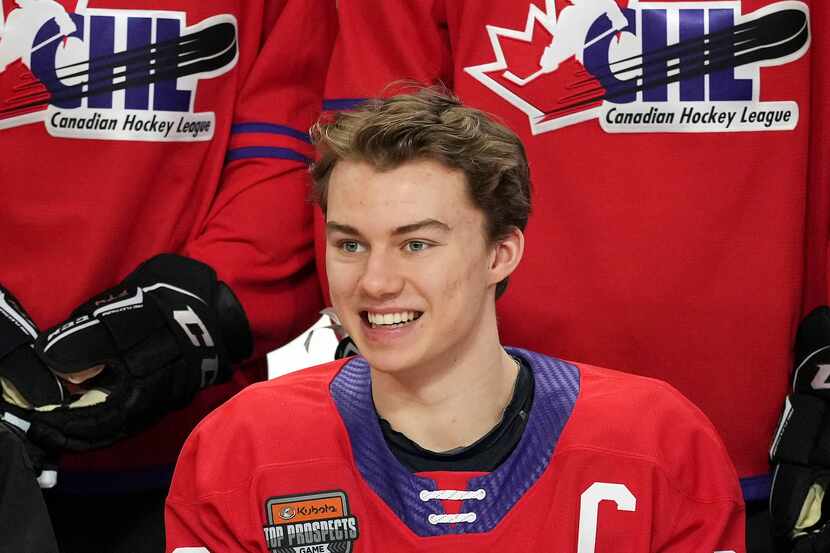 Regina Pats' Connor Bedard smiles for a team photo ahead of the CHL/NHL Top Prospects game,...