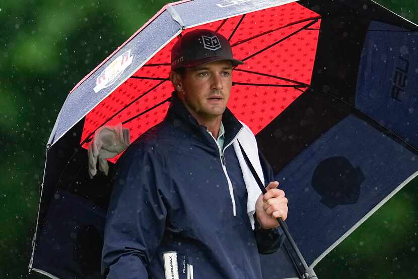 Bryson DeChambeau waits to play on the second hole during the third round of the PGA...