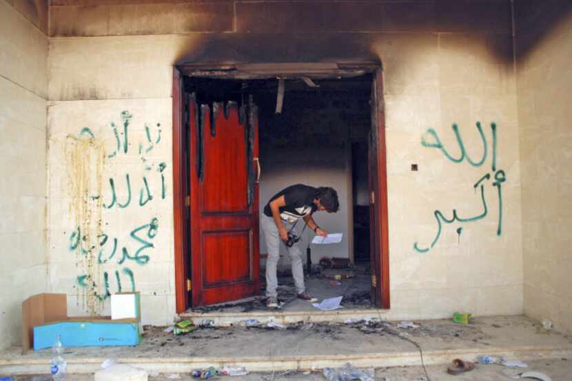 A man looked at documents at the U.S. Consulate in Benghazi, Libya, a day after the American...