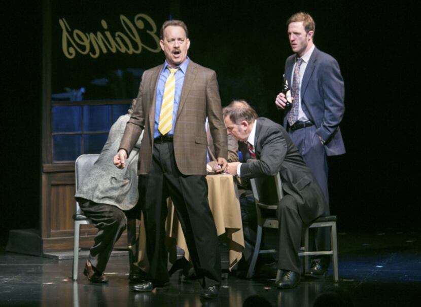 FILE -- Tom Hanks, center, during a scene in "Lucky Guy," at the Broadhurst Theater in New...