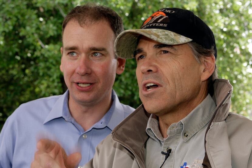 Michael Quinn Sullivan (left) spoke to then-Gov. Rick Perry before a "Don't Mess With Texas"...