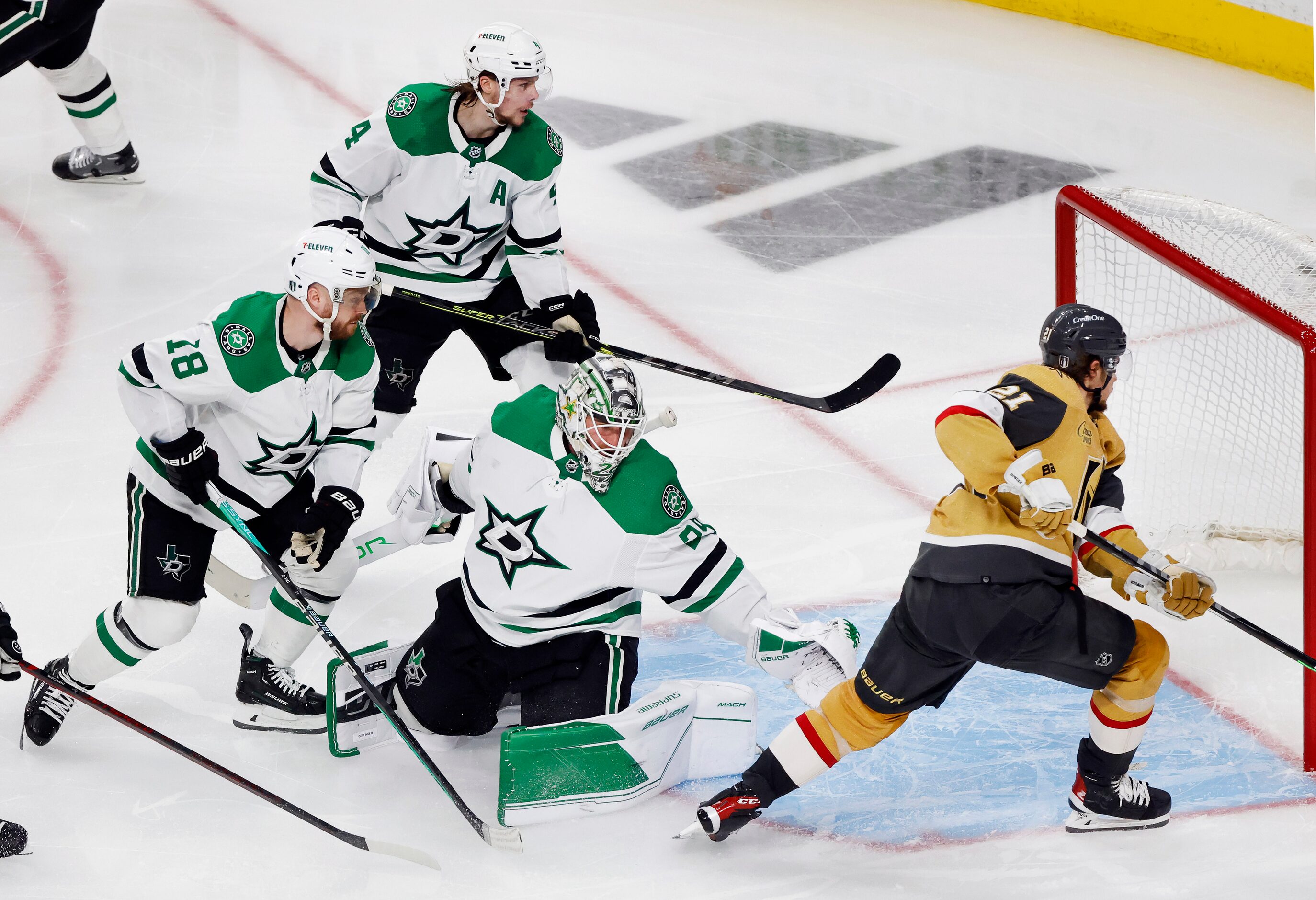 Vegas Golden Knights center Brett Howden (21) chases down his first shot before scoring the...