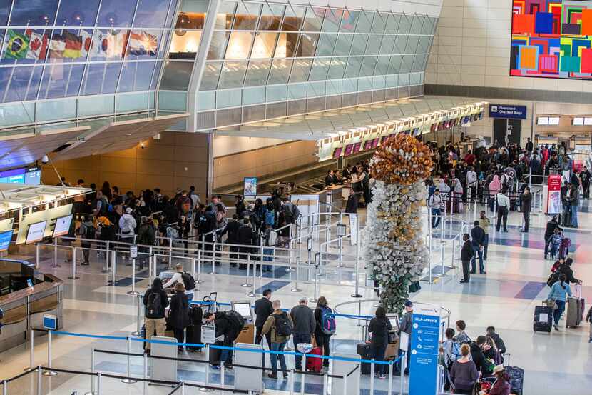 Four days before Christmas in 2019, travelers waited through long security lines at DFW...