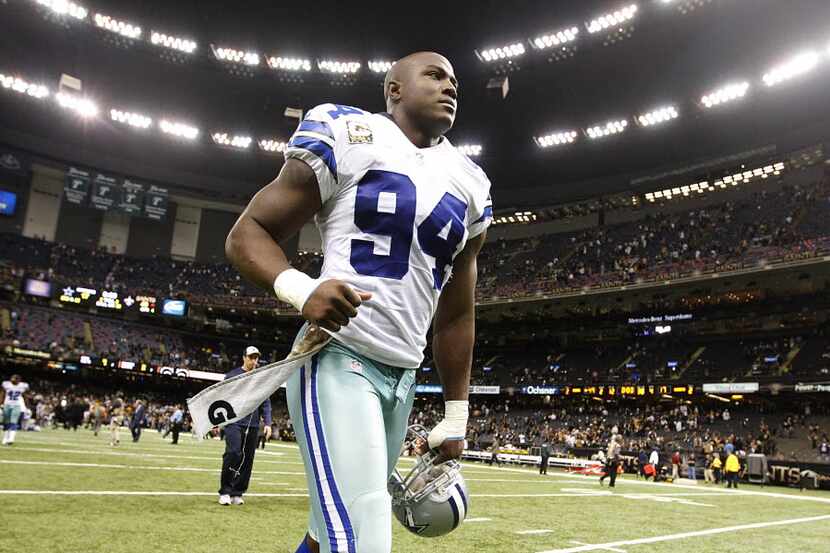 Dallas Cowboys defensive end DeMarcus Ware (94) leaves the field at Mercedes-Benz Superdome...