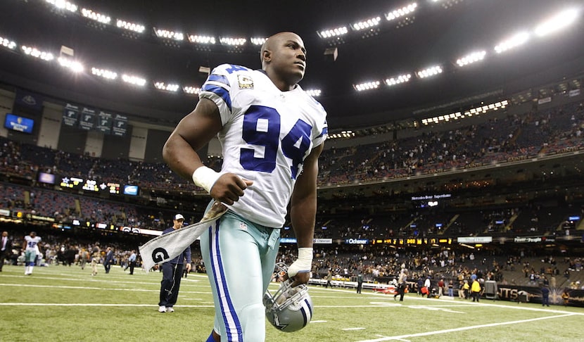 Dallas Cowboys defensive end DeMarcus Ware (94) leaves the field following the Cowboys 49-17...