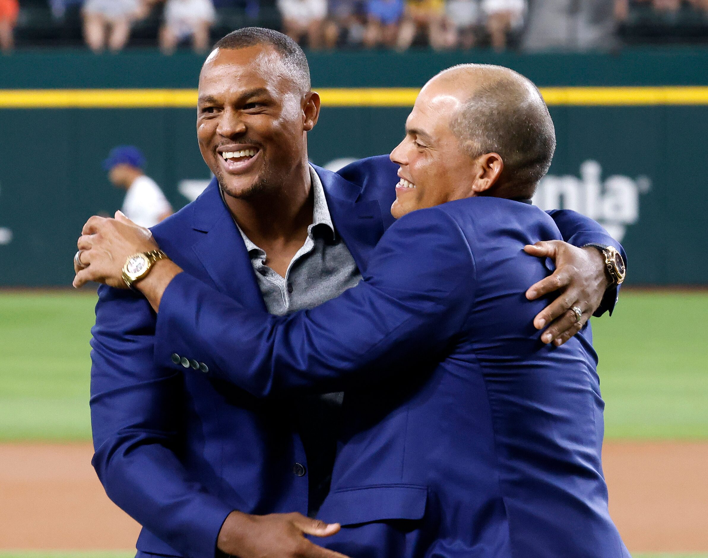 Former Texas Rangers third baseman Adrian Beltre (left) is congratulated by former Rangers...