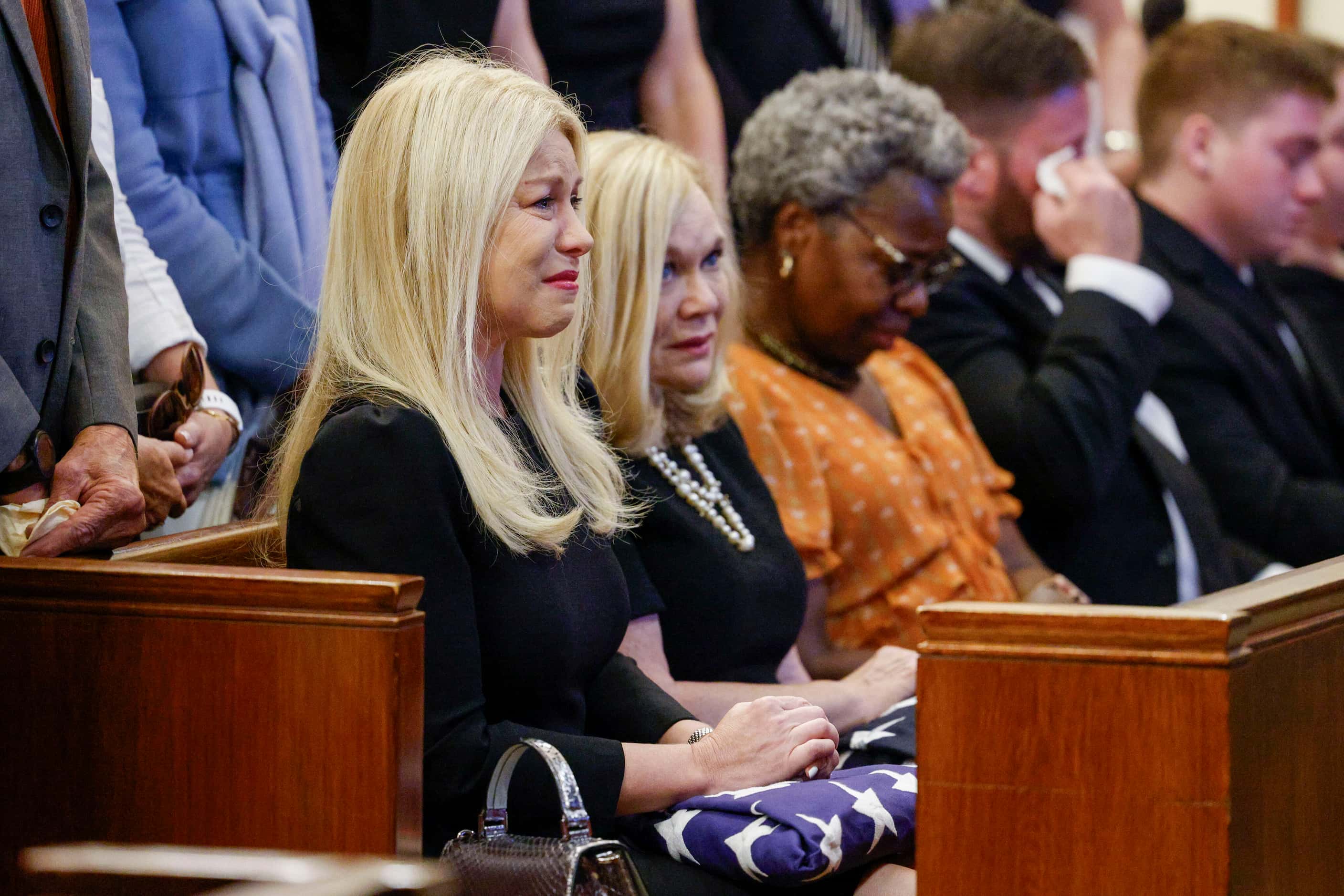 David Kunkle’s wife Sarah Dodd is overcome with emotion alongside her mother Vicki Dodd as...