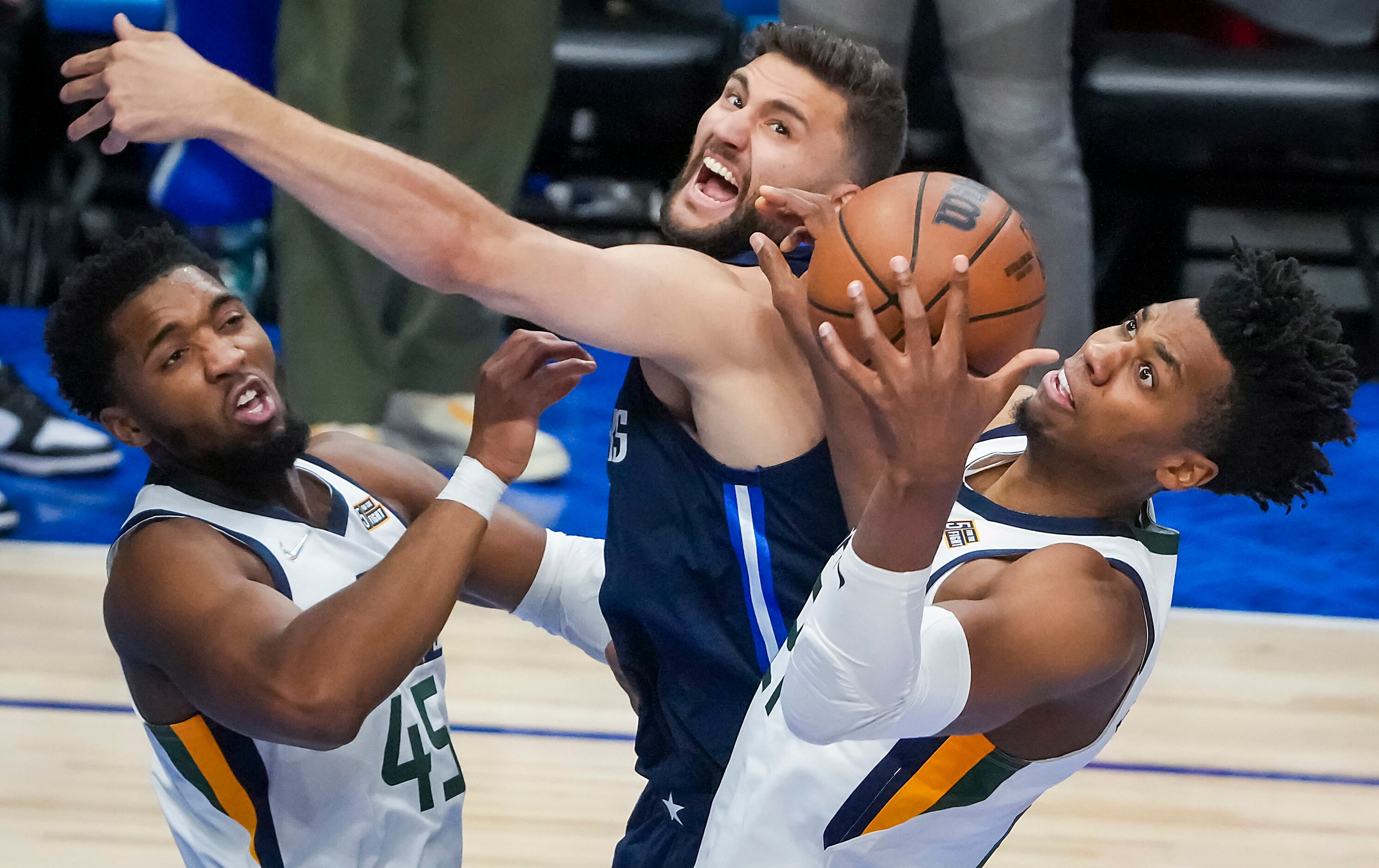 Dallas Mavericks forward Maxi Kleber (42) fights for a rebound with Utah Jazz center Hassan...