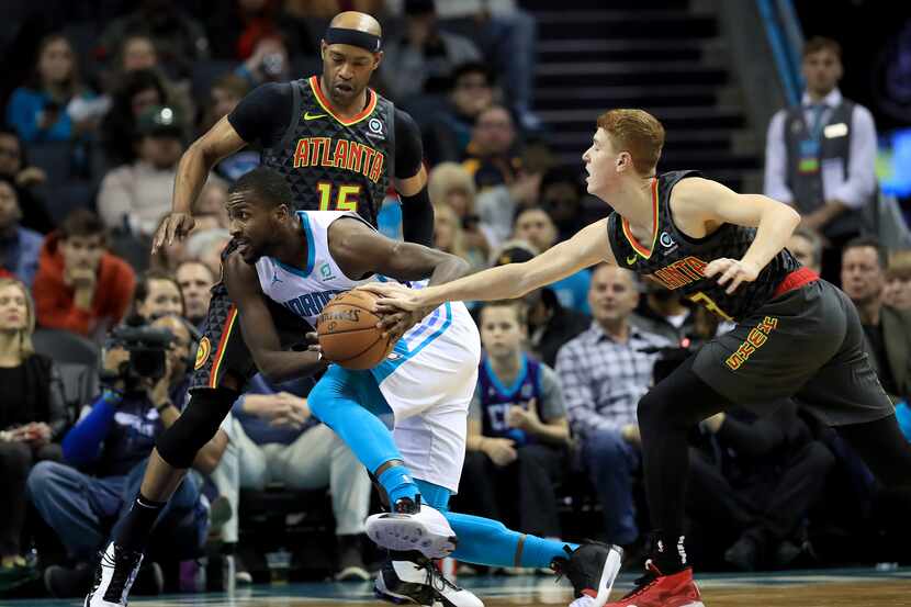 CHARLOTTE, NORTH CAROLINA - DECEMBER 08: Michael Kidd-Gilchrist #14 of the Charlotte Hornets...