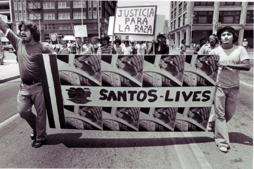 Demonstrators held a banner honoring Santos Rodriguez as they marched for racial justice in...