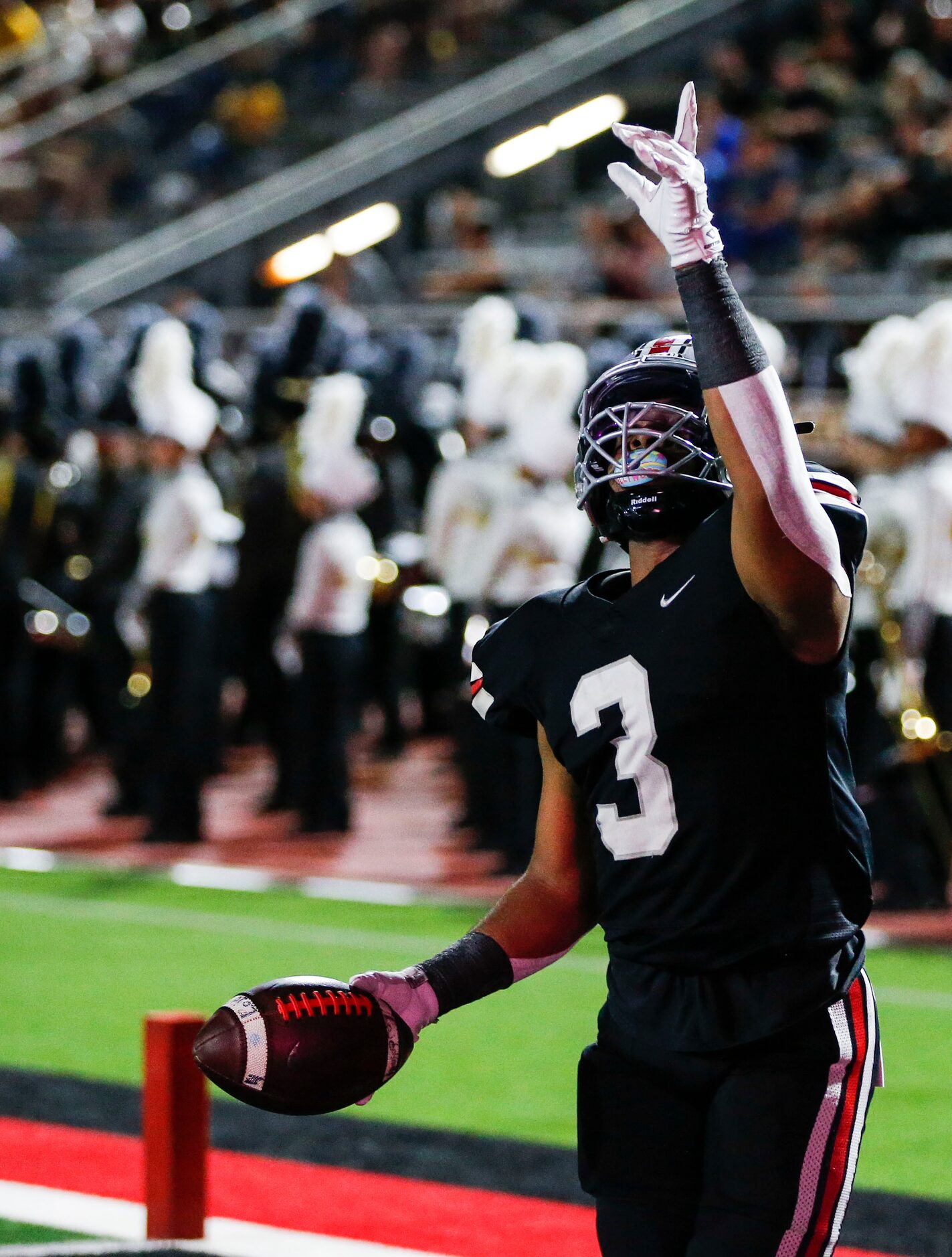 Lovejoy senior running back Noah Naidoo celebrates scoring a touchdown during the first half...