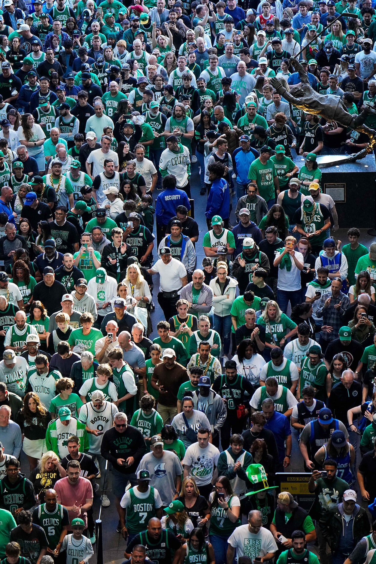 Fans wait for the gates to open before Game 2 of the NBA Finals between the Dallas Mavericks...