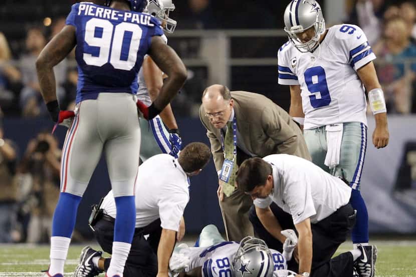 Dallas Cowboys wide receiver Dez Bryant (88) is tended to by the medical staff as Dallas...