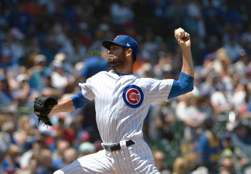 Chicago Cubs starting pitcher Cole Hamels (35) delivers against the St. Louis Cardinals...