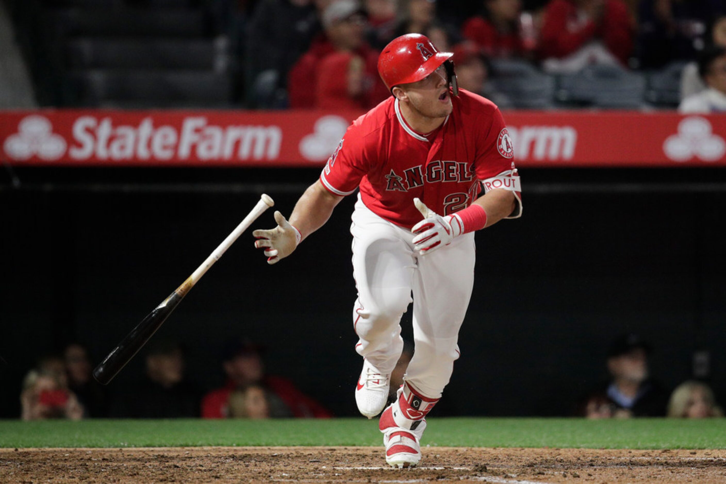 Los Angeles Angels' Mike Trout watches his home run during the sixth inning of the team's...