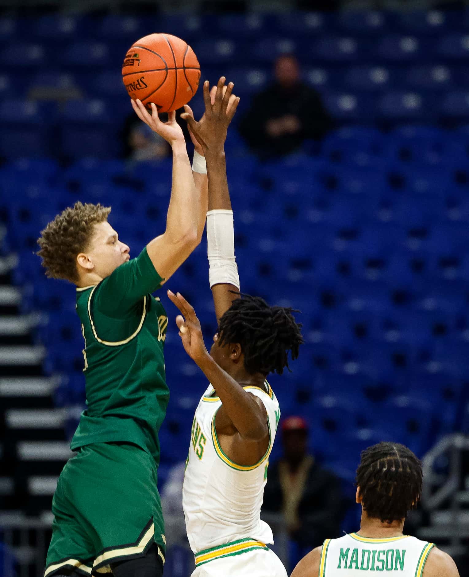 San Antonio Cole guard Trey Blackmore (11) attempts a three-point shot as time expires over...
