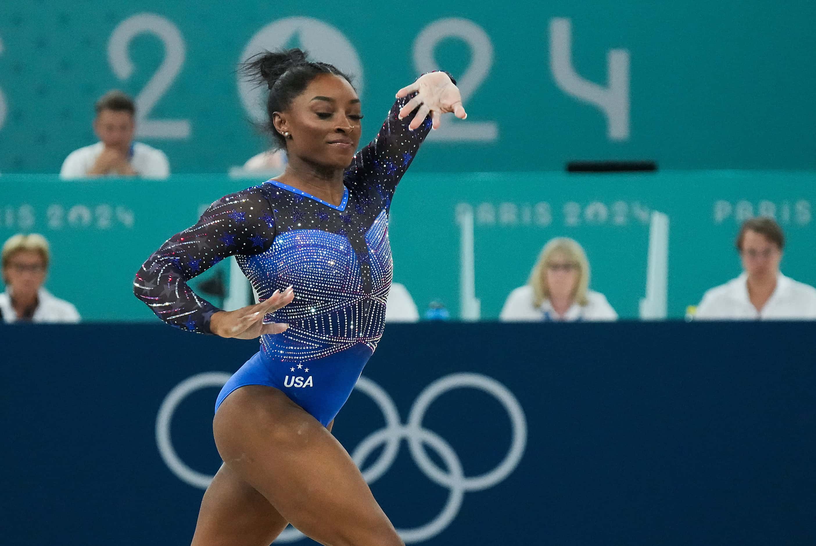 Simone Biles of the United States competes on the floor during the women’s gymnastics...