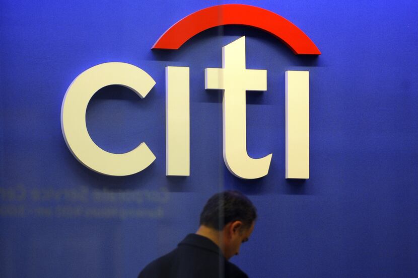 (FILES)A man at a Citibank branch at the US bank Citigroup world headquarters on Park...