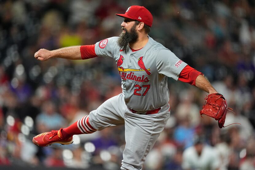 St. Louis Cardinals relief pitcher Andrew Kittredge works against the Colorado Rockies in...