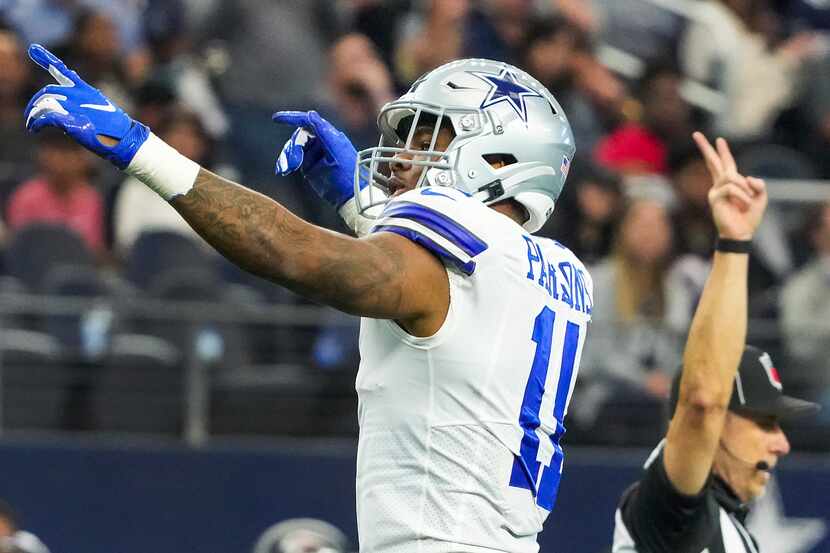 Dallas Cowboys outside linebacker Micah Parsons (11) celebrates after sacking Atlanta...