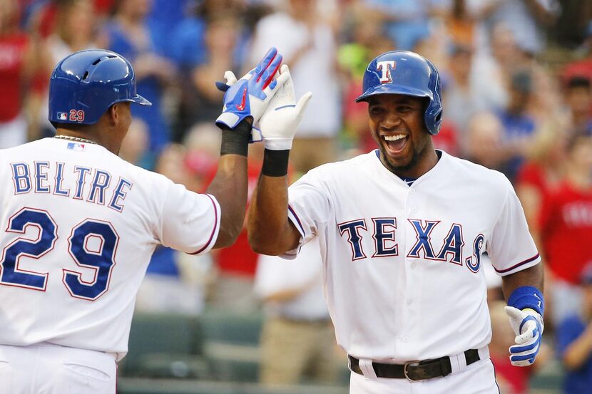 El paracorto Elvis Andrus y el tercera base Adrián Beltré. (DMN/MICHAEL REAVES)