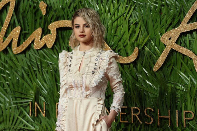 Singer Selena Gomez poses upon arrival at The British Fashion Awards 2017 in London, Monday,...