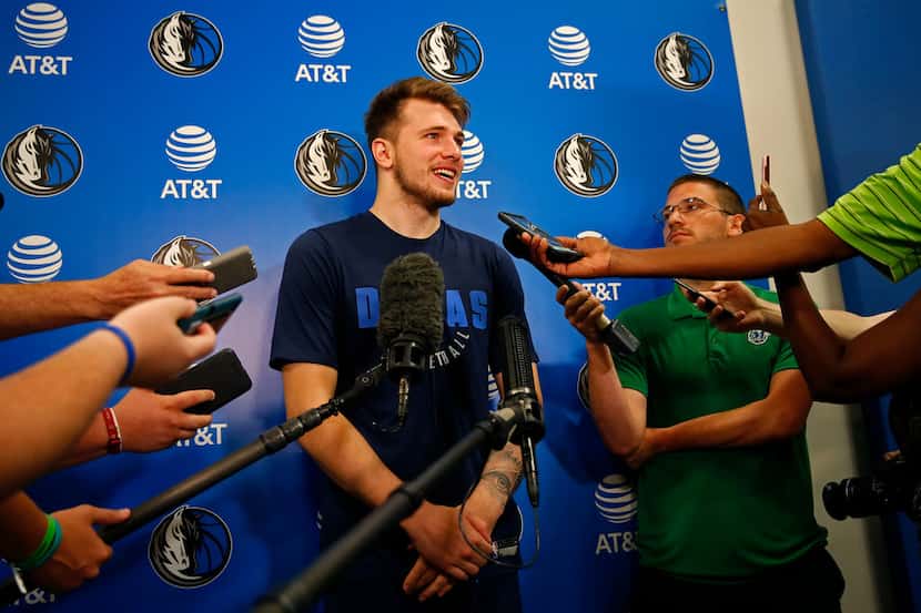 Mavericks guard/forward Luka Doncic talks with the media after a Dallas Mavericks NBA Summer...