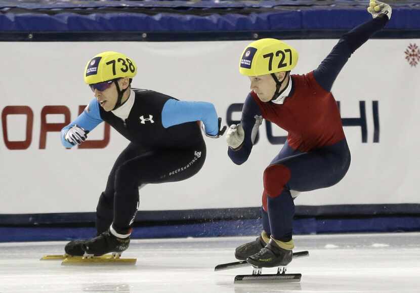 Jordan Malone, left, and Keith Carroll Jr., compete in the men's 500 meters during the U.S....