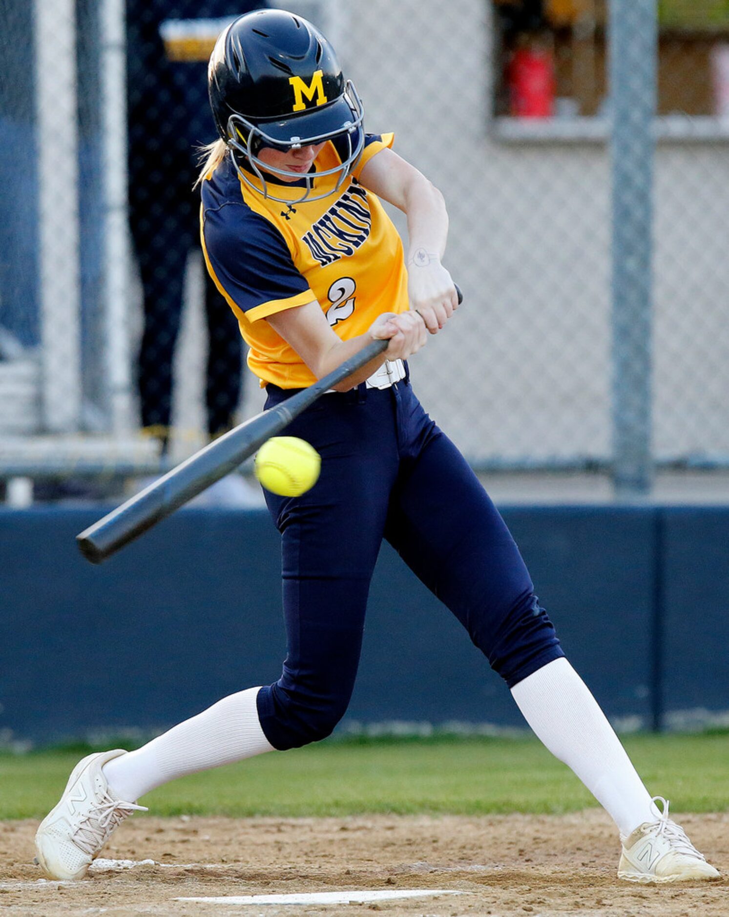 McKinney High School pitcher Jo Cabana (2) gets a hit in the first inning as McKinney High...