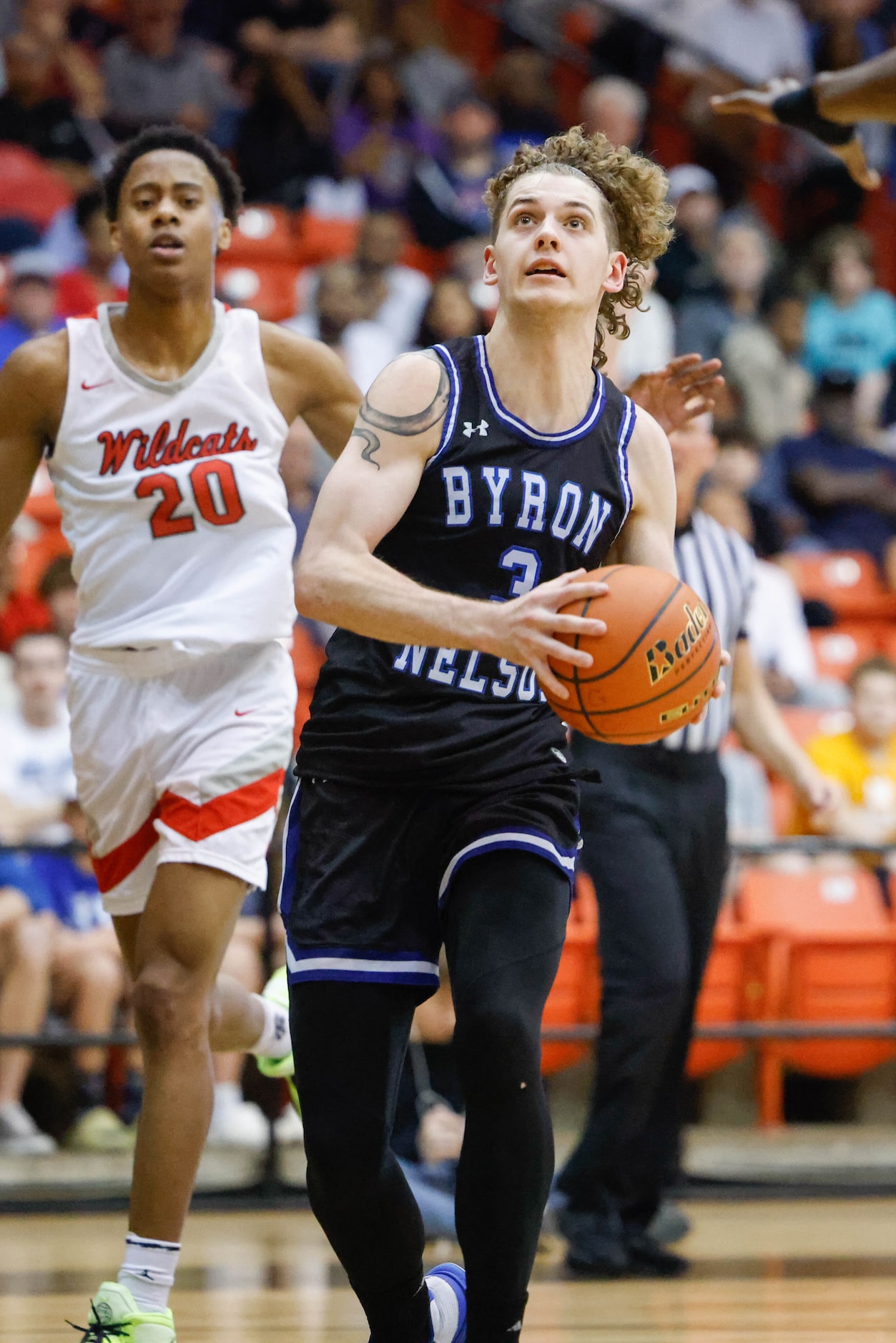 Byron Nelson High School' Finley Bizjack (3) goes for a shot against Lake Highlands High...