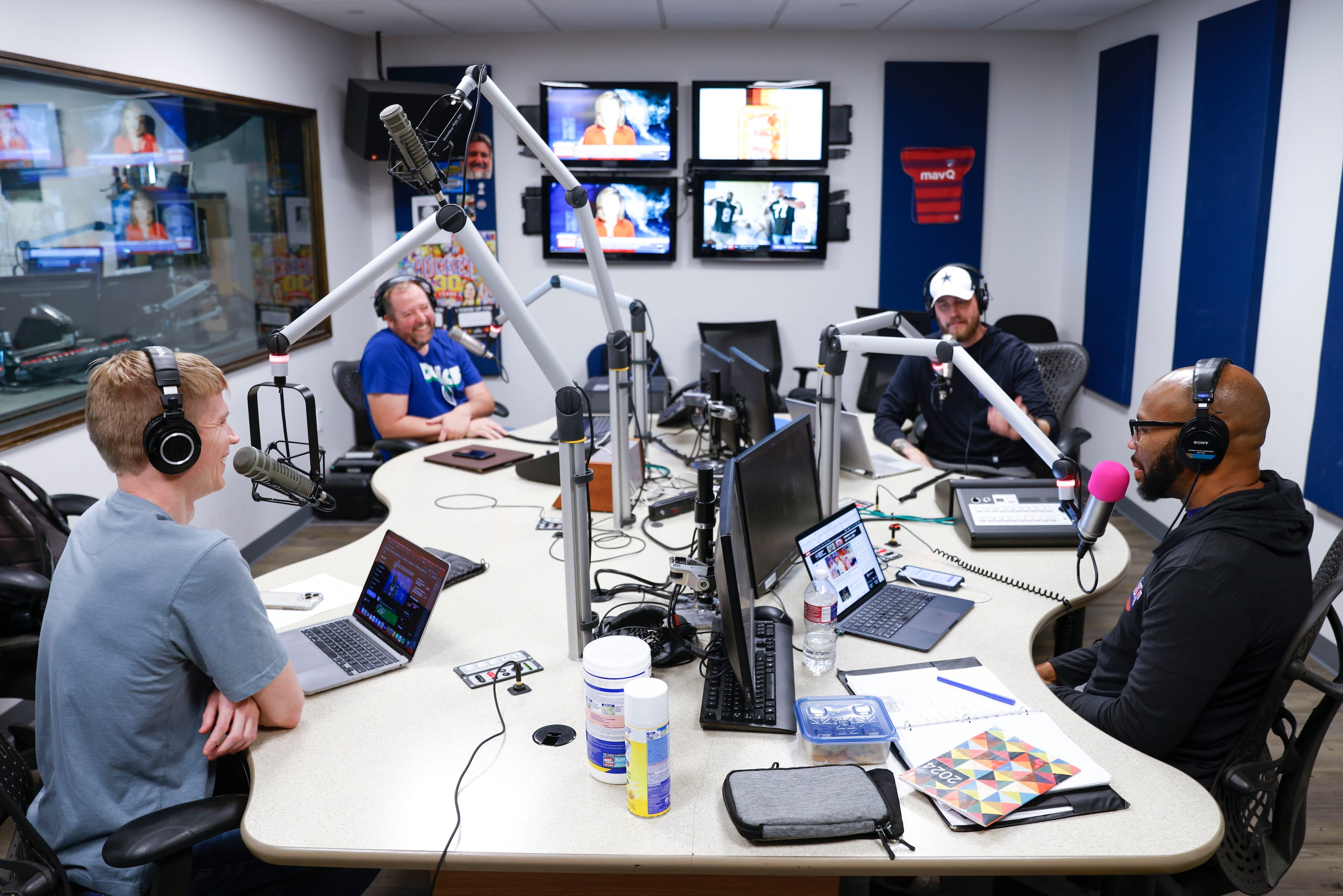  "The Ticket" host Matt McClearin (back right) with his co-host Donovan Lewis (front right)...