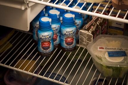 The Taylors' refrigerator is stocked with items to help Laura keep the pounds on. 