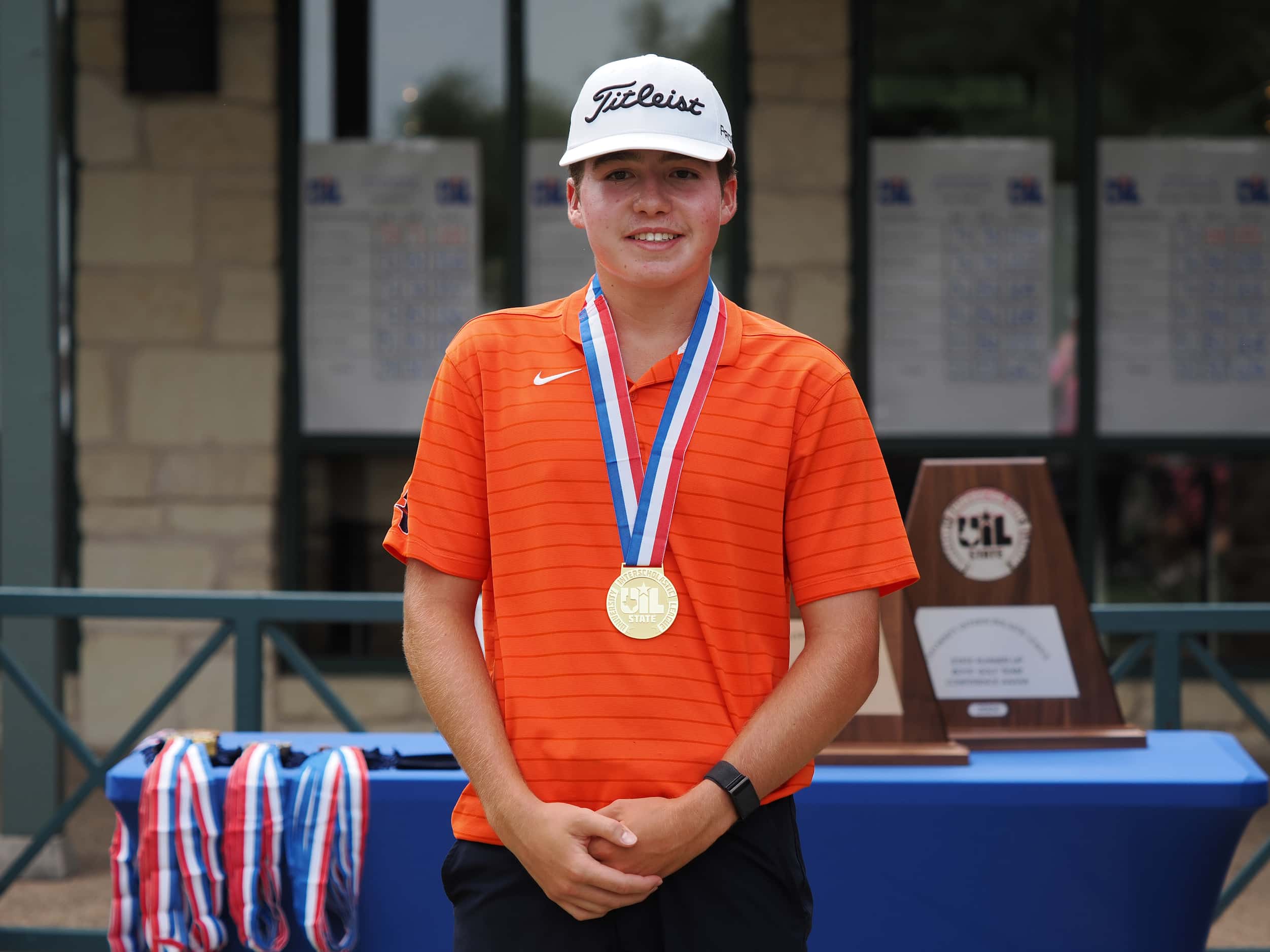 Frisco Wakeland’s Luke Colton receives the first place medal following the UIL Boy’s 5A High...