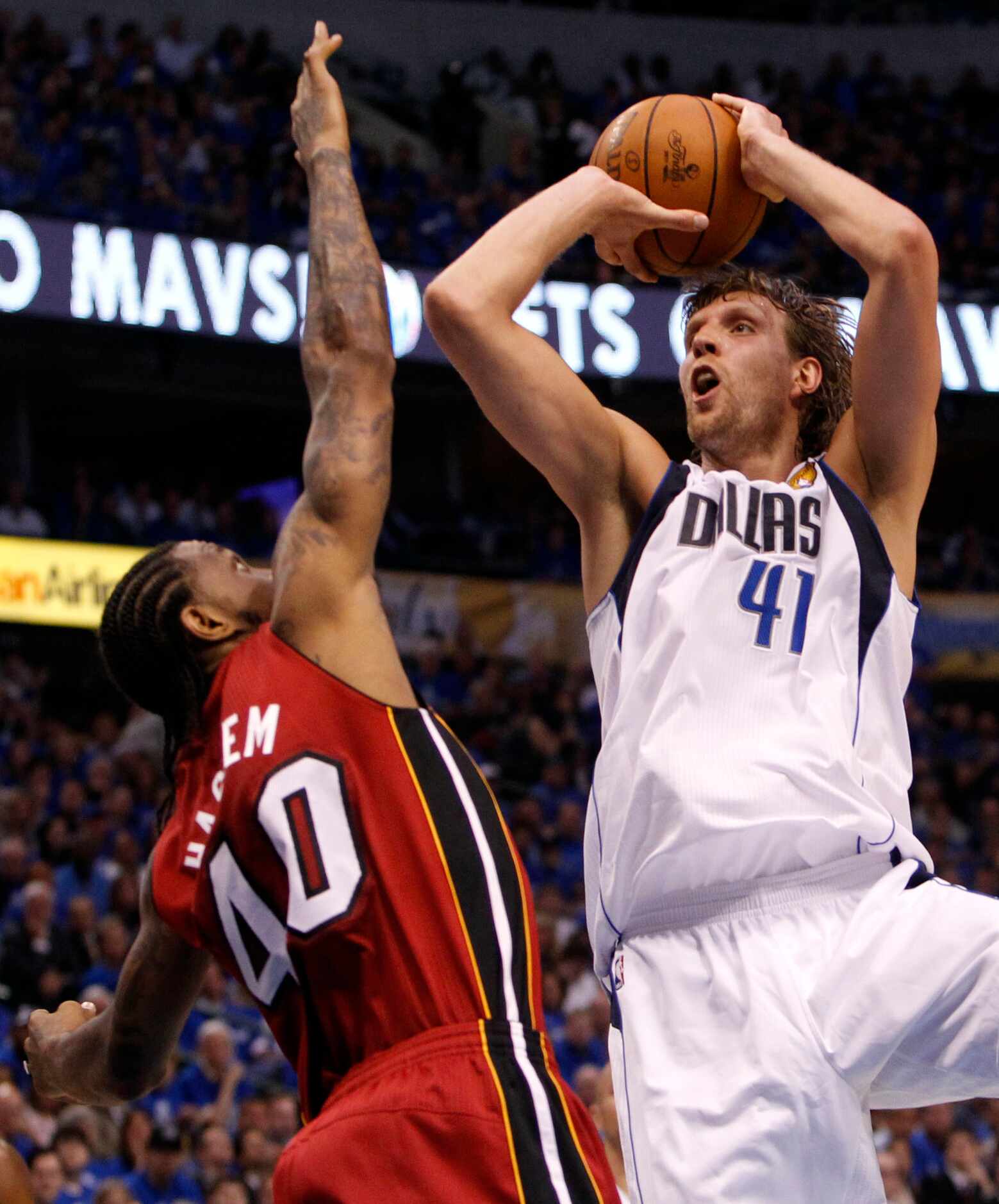 Miami Heat power forward Udonis Haslem (40) defends Dallas Mavericks power forward Dirk...