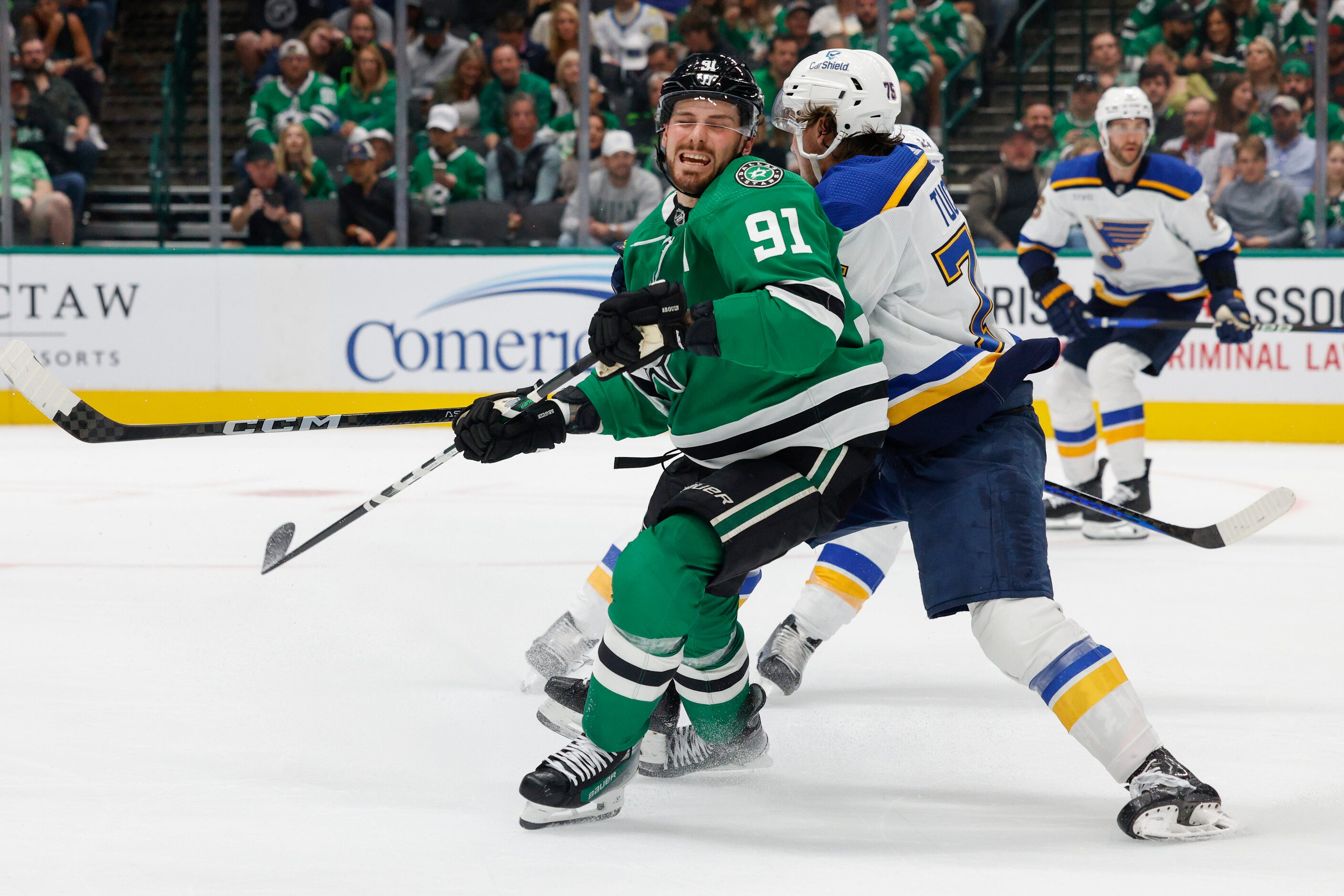 St. Louis Blues defenseman Justin Faulk (72) hits Dallas Stars center Tyler Seguin (91)...