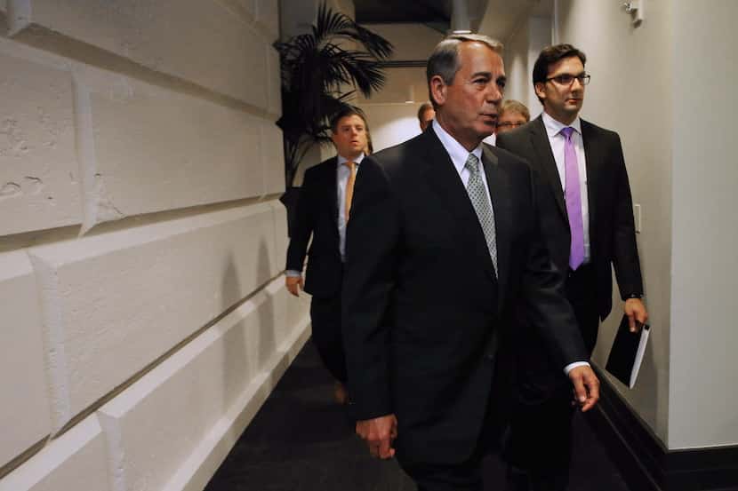  House SpeakerÂ John Boehner heads to the floor for votes afterÂ a GOP conference meeting at...