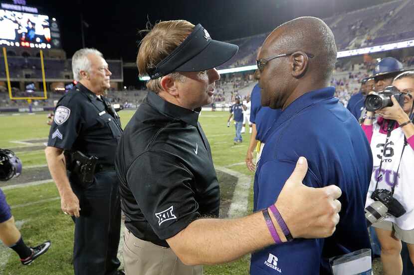 TCUcoach Gary Patterson, left, greet Jackson State Tigers coach Tony Hughes after an NCAA...