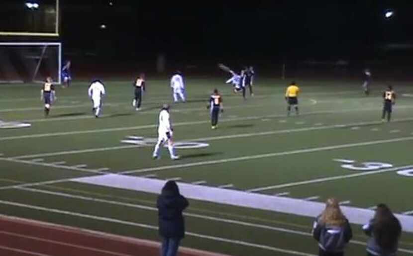 Prosper's Boni Zarate scores on a bicycle kick Tuesday, Feb. 18, 2015, during his team's 9-1...