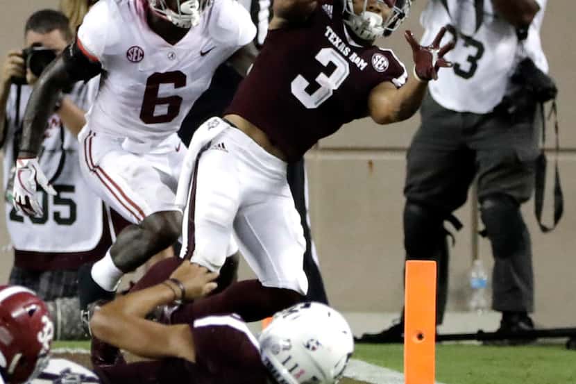 Texas A&M wide receiver Christian Kirk (3) catches a pass for a touchdown as Alabama...