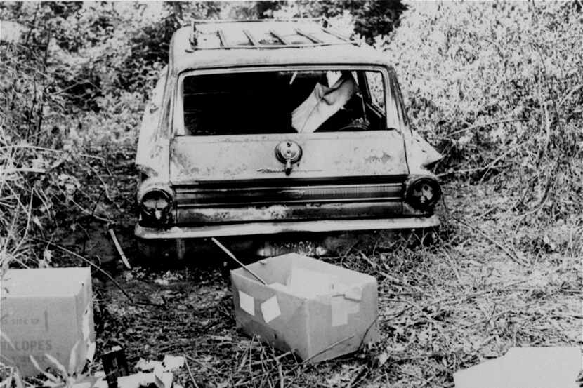 The burned station wagon of three missing civil rights workers — Michael Schwerner, Andrew...