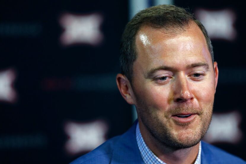 Oklahoma head football coach Lincoln Riley talks with the media during a breakout session in...