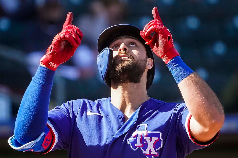 Texas Rangers outfielder Joey Gallo celebrates after hitting a 3-run home run during the...