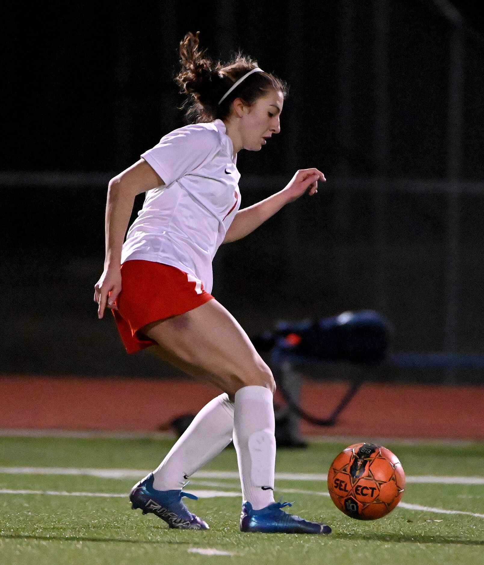 Frisco Centennial’s Bella Carrillo (7) controls the ball during a girls soccer game between...