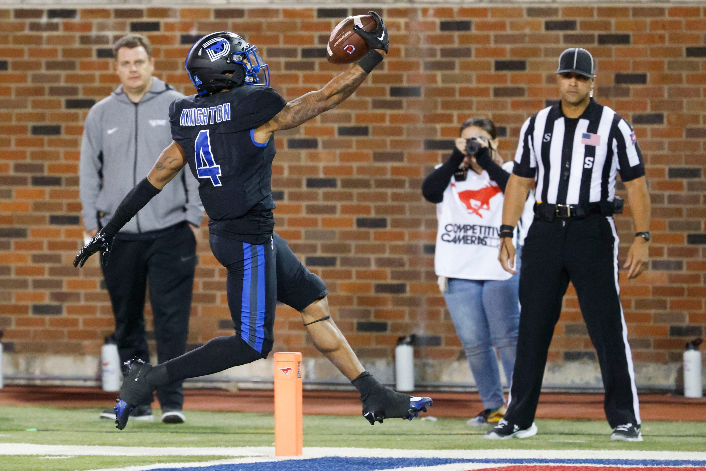 Southern Methodist Mustangs running back Jaylan Knighton scores a touchdown against UNT...