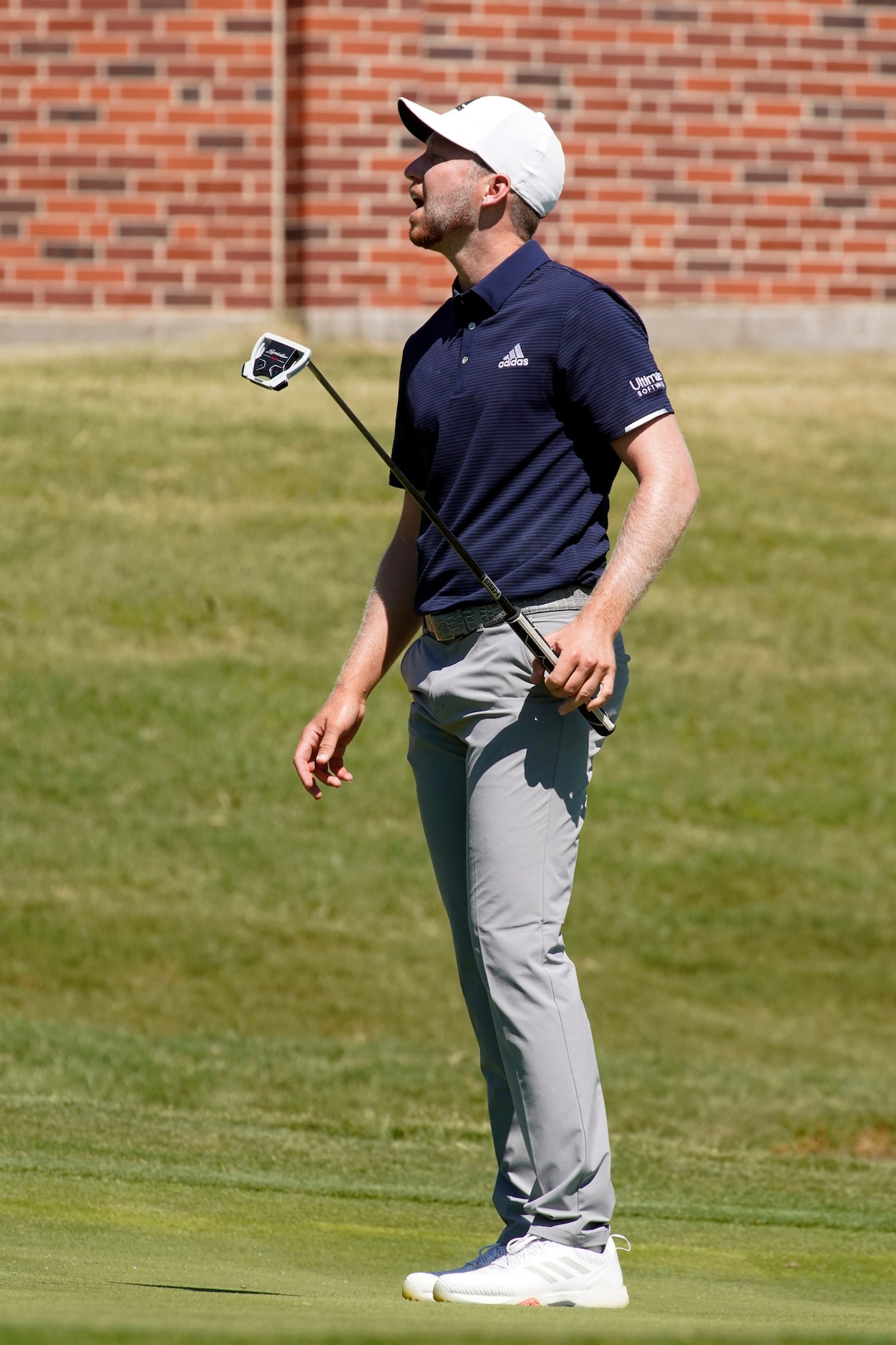 PGA Tour golfer Daniel Berger reacts after missing his birdie putt on No. 16 during the...